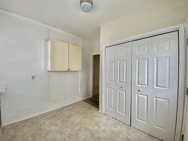 unfurnished bedroom with a closet