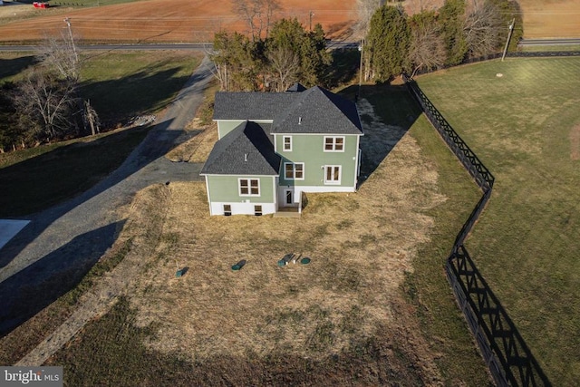 birds eye view of property featuring a rural view