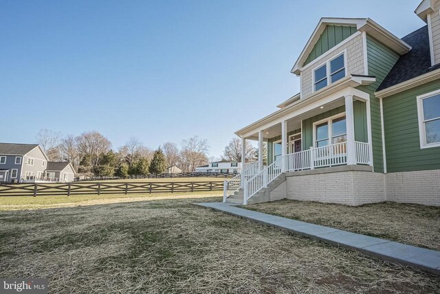 view of yard featuring a porch