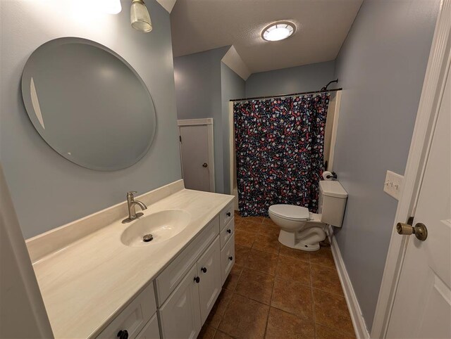 bathroom featuring tile patterned floors, vanity, toilet, and a shower with shower curtain