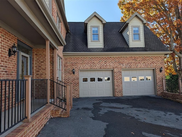 view of side of home with a garage