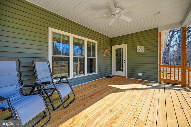 wooden terrace with ceiling fan