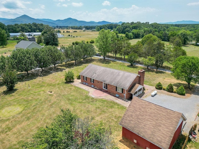 drone / aerial view with a rural view and a mountain view