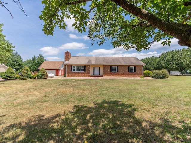 single story home with a garage and a front lawn