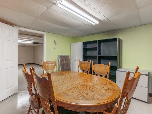 dining space featuring a paneled ceiling