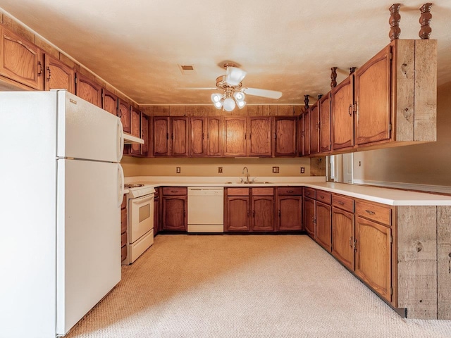 kitchen featuring ceiling fan, white appliances, and sink