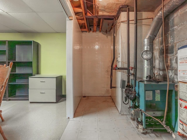 utility room featuring water heater