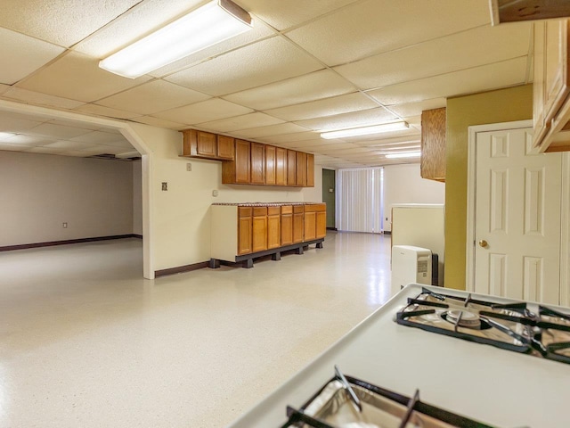 kitchen with a paneled ceiling