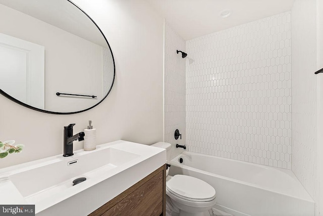 full bath with vanity,  shower combination, and toilet