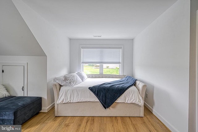 bedroom featuring light wood-type flooring