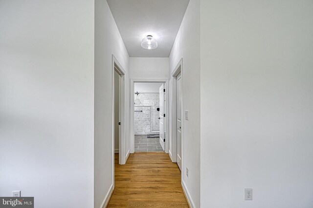 hall featuring light hardwood / wood-style floors