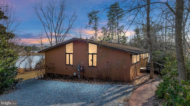 view of property exterior at dusk