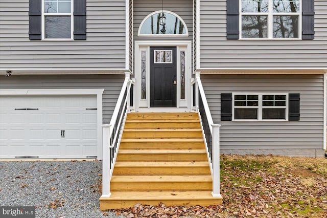 property entrance with an attached garage