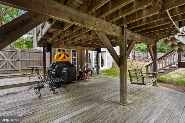 wooden deck with grilling area