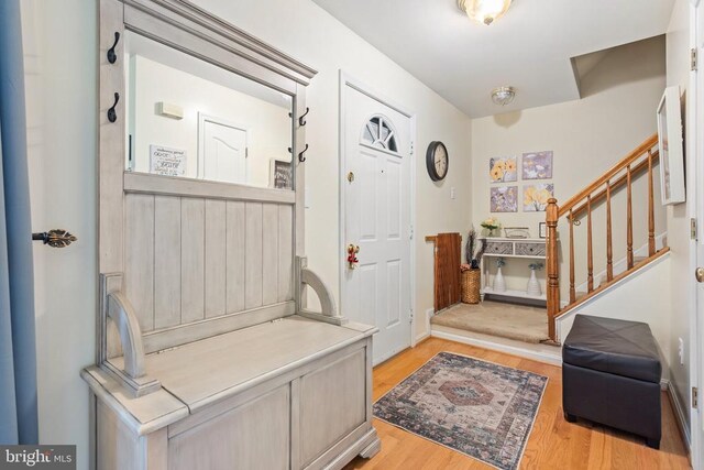 foyer entrance featuring light hardwood / wood-style flooring