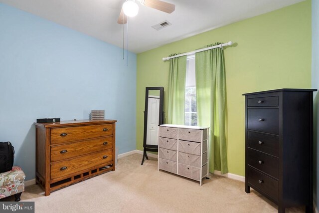 carpeted bedroom featuring ceiling fan