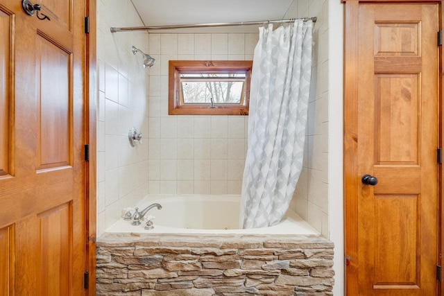 bathroom featuring shower / bath combo with shower curtain