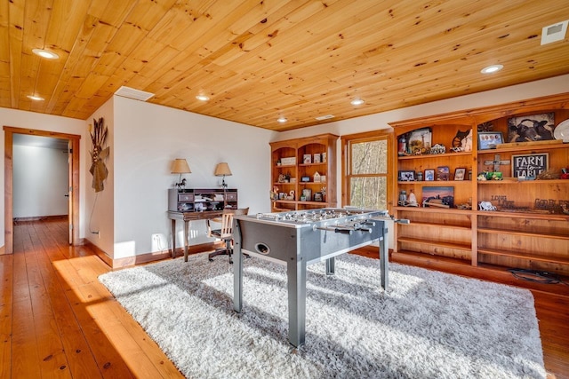 recreation room featuring wood ceiling and light hardwood / wood-style flooring