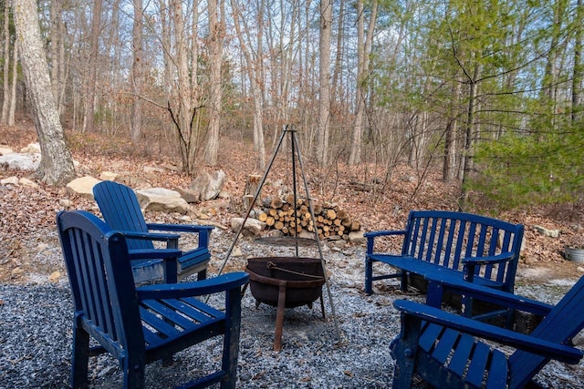 view of patio / terrace featuring an outdoor fire pit