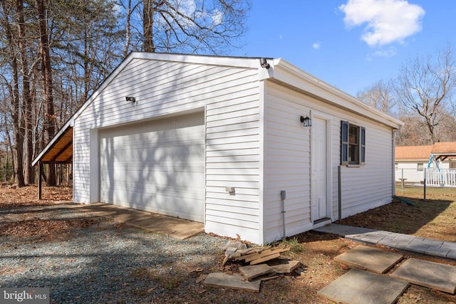 detached garage with fence