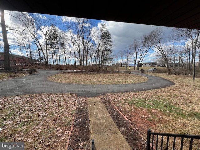 view of road featuring aphalt driveway