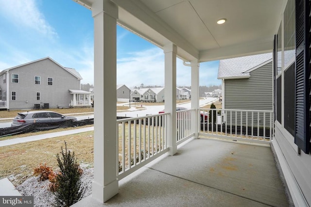 balcony with a porch and a residential view