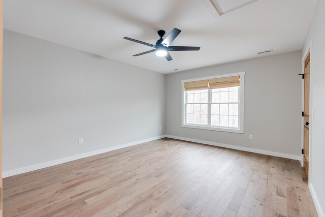 unfurnished room featuring ceiling fan and light hardwood / wood-style floors