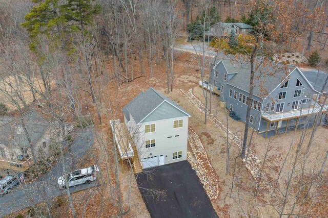 view of home's exterior with a wooden deck and central air condition unit