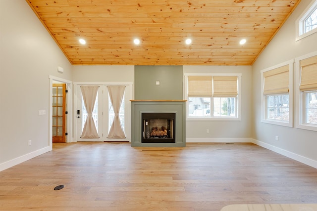 unfurnished living room featuring wood ceiling, lofted ceiling, and light wood-type flooring