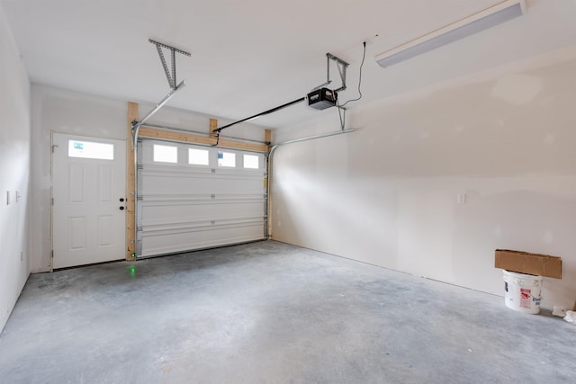 garage featuring a garage door opener