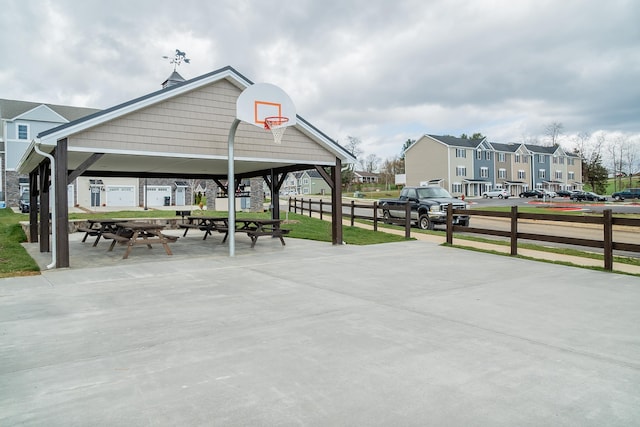 view of patio / terrace featuring a gazebo and basketball court