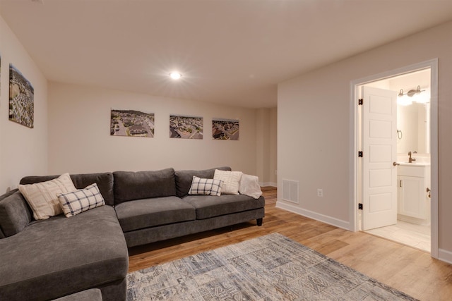 living room featuring hardwood / wood-style flooring