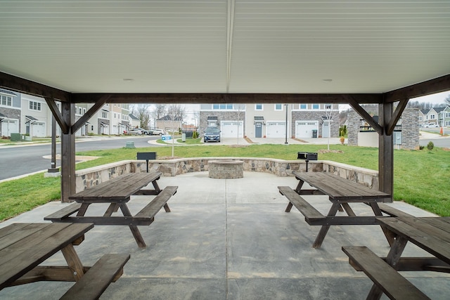 view of patio / terrace with a fire pit