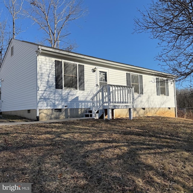 view of front of home with crawl space