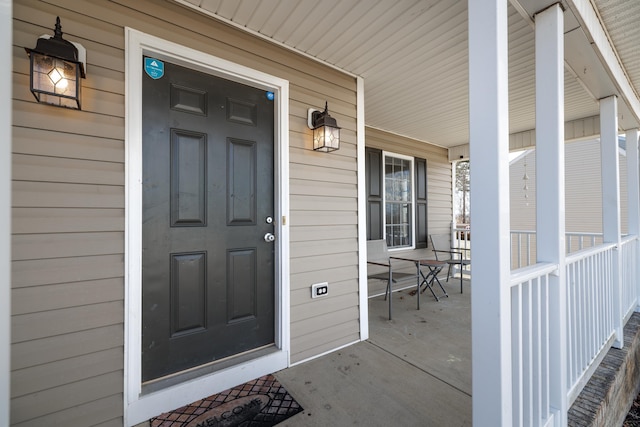 entrance to property with covered porch