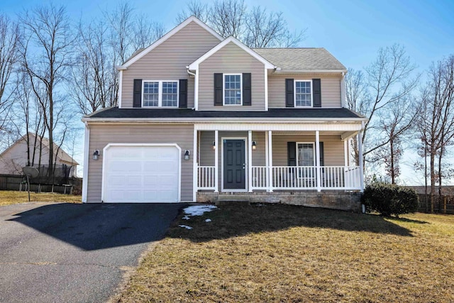 view of front of home with roof with shingles, covered porch, an attached garage, a front yard, and driveway