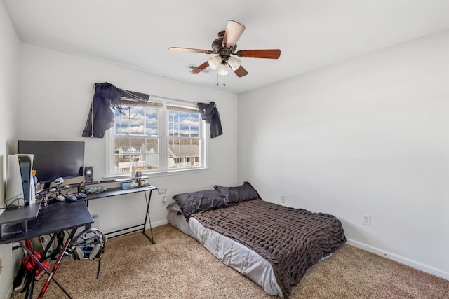 bedroom with carpet, baseboards, and ceiling fan