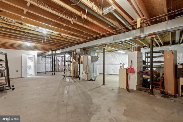 basement featuring heating unit