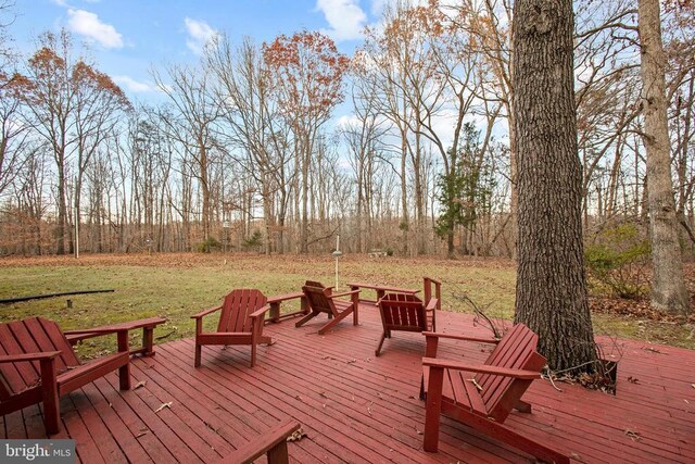 deck featuring a lawn