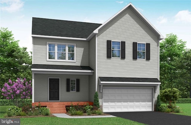 view of front of home featuring a garage