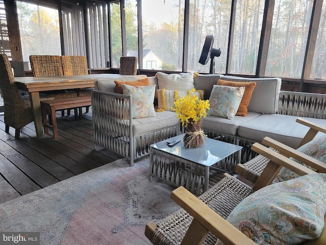 sunroom featuring a healthy amount of sunlight