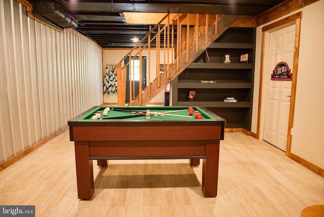 rec room with billiards, baseboards, and wood finished floors