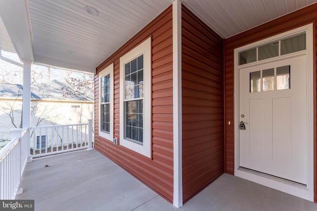 entrance to property with covered porch