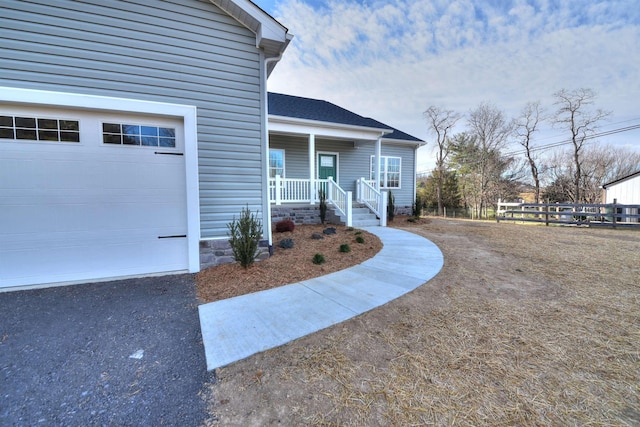 entrance to property with covered porch