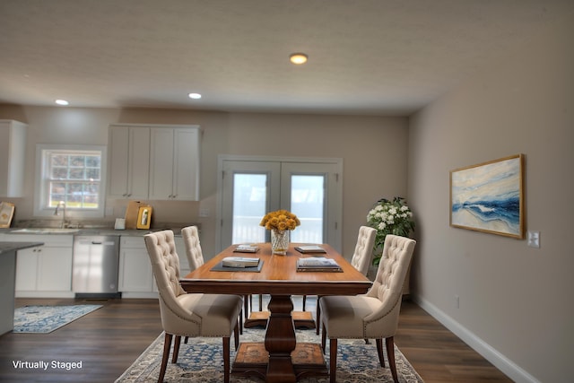 dining space featuring dark wood-type flooring, recessed lighting, french doors, and baseboards