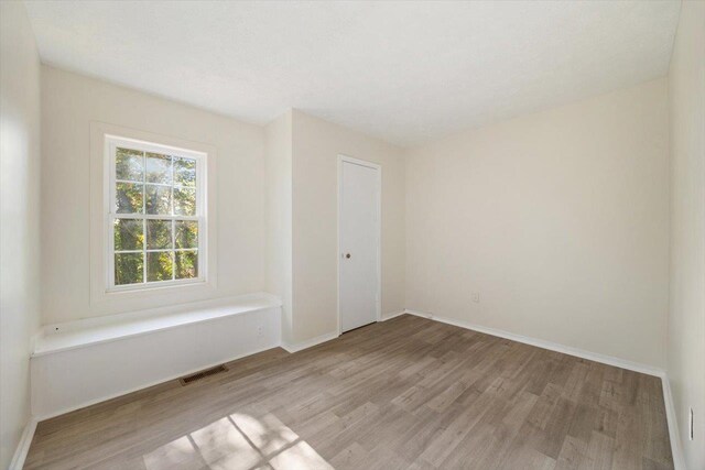 empty room featuring light hardwood / wood-style flooring