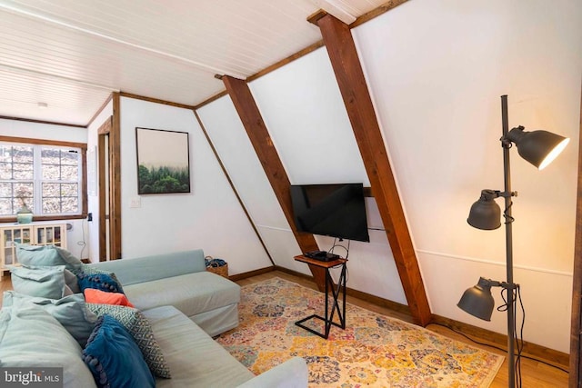 living area with light wood-style floors and baseboards