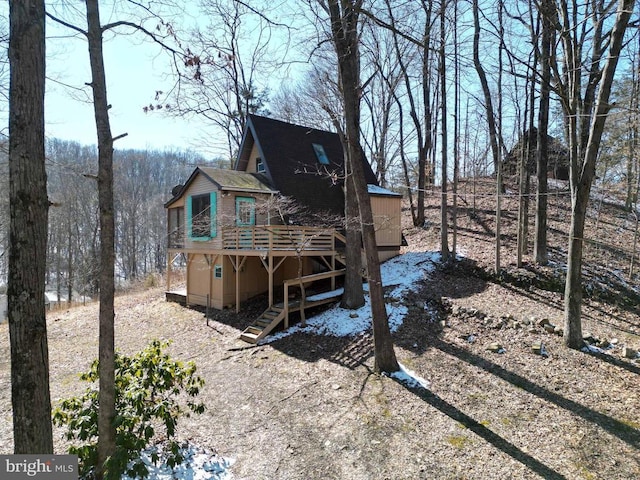 rear view of house with a deck