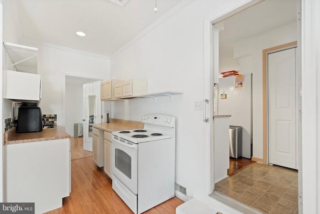 kitchen featuring crown molding, light hardwood / wood-style flooring, and white range with electric stovetop