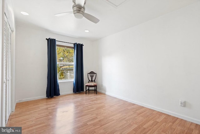 unfurnished room with light hardwood / wood-style floors and ceiling fan